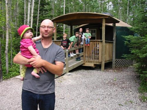 Photos 04, 05, and 06 show Dad Neil Corrigan with daughter Molly in foreground, and Patrick, Owen, Colin, Mom Mindy, and Mikey in background, in front of their yurt.¤ Bill Redekop / Winnipeg Free Press