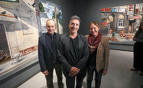 RUTH BONNEVILLE  /  WINNIPEG FREE PRESS 

ENT  - WAG

Group photo of Cree artist Kent Monkman (centre), with Dr. Stephen Borys, WAG CEO and Jaimie Isaac, curator of Contemporary & Indigenous Art, WAG, at the opening of Shame and Prejudice: A Story of Resilience, at the Winnipeg Art Gallery on Friday. 

Monkman's works of art on the plight of Indigenous Peoples, are on the walls behind. them.   

Note: The art work on the left side of photo is called The Deposition, from the series Urban Res, 2014, (depicts a person suffering from trauma at an actual location in Winnipeg's north end), is now permanently a part of the collection of the WAG by a gift from an anonymous donor.  

See story.

Sept 27th, 2019 
