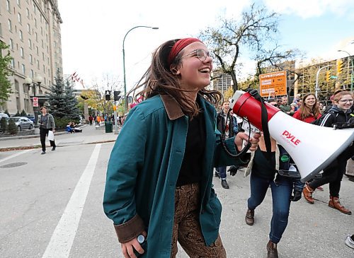 RUTH BONNEVILLE  /  WINNIPEG FREE PRESS 

Local - Climate Strike Canoe 

Lena Andres with Manitoba Youth for Climate Action. rallies up the hundreds of students, teachers, parents and supporters during the Climate Strike walk along Broadway Ave. Friday.



See story.

Sept 27th, 2019 
