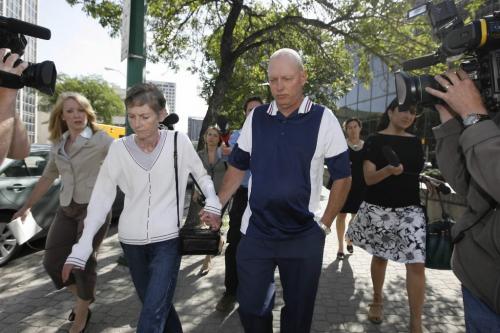 MIKE.APORIUS@FREEPRESS.MB.CA Parents Monty and Bonny Anderson leave the Law Courts Tuesday after their son Daniell was sentenced to 14 years in prison for shooting at police officers in 2006.  July 21/2009 WINNIPEG FREE PRESS