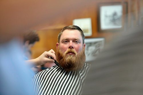 RUTH BONNEVILLE  /  WINNIPEG FREE PRESS 

SUNDAY Special  - Waltz on In, Barbershop

For the Sunday special for Oct. 6th. 
Feature about Waltz on In barber shop and the new generation of very tight-knit barbers running the place. 

Client gets his beard trimmed.

Photos of the barbers cutting hair, its general atmosphere, archival photos on wall of original owner and group shots of the barbers out in front in their blue Waltz on In shirts.  A couple of the guys have their motorcycles in the shot. 

Reporter: Declan Schroeder

Oct 3rd,  2019 

