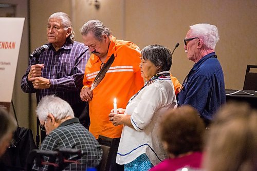 MIKAELA MACKENZIE / WINNIPEG FREE 
Wanbdi Wakita (left) says a prayer with elder Ernie Daniels, Maata Evaluardjuk-Palmer, and Piita Irniq at the opening ceremony of the Maamiikwendan Gathering at the Fairmont in Winnipeg on Wednesday, Oct. 16, 2019. For Maggie Macintosh story.
Winnipeg Free Press 2019.