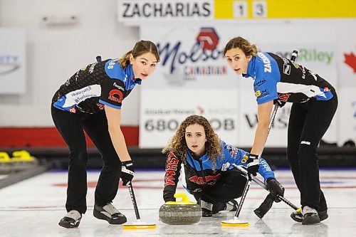 MIKE DEAL / WINNIPEG FREE PRESS
Skip Mackenzie Zacharias throws a rock while team mates Karlee Burgess (left) and Emily Zacharias (right) start to sweep during a game against Team Einarson at the 2019 Canad Inns Classic in Portage la Prairie at the Portage Curling Club Thursday.
191017 - Thursday, October 17, 2019.