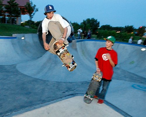 BORIS MINKEVICH / WINNIPEG FREE PRESS  090806 Jeff Proschuk,15, does a skate trick as Clayton Sesh,15, watches at the forks skate park.