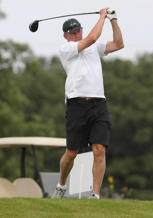 Brandon Sun John Paddock watches his drive off the third tee at the Oak Island Golf Course during the first annual Brandon Wheat Kings Alumni Association Golf Tournament on Thursday afternoon. (Bruce Bumstead/Brandon Sun)