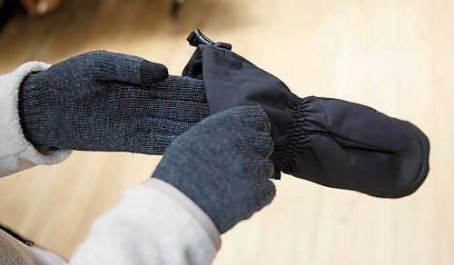 MIKE DEAL / WINNIPEG FREE PRESS
Katheryn Loewen, Sales associate at MEC with an example of layering a warm but thin merino wool liner glove with a gauntlet mitt to add extra warmth when outside for long periods at the Portage Avenue Mountain Equipment Co-op store.
see Sabrina column
191105 - Tuesday, November 05, 2019.