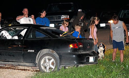 BORIS.MINKEVICH@FREEPRESS.MB.CA BORIS MINKEVICH / WINNIPEG FREE PRESS  090811 2 car MVC on Lorne Hill south of Garvin Rd in an uncontrolled intersection, gravel road.