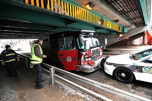 RUTH BONNEVILLE  /  WINNIPEG FREE PRESS 

Local - Stolen Fire Truck

Winnipeg Police Officers and Fire Crews view the damage on a stolen fire truck that was stopped by a police vehicle under the Donald Street Bridge on Assiniboine Ave. Friday.  


Nov 29th   2019