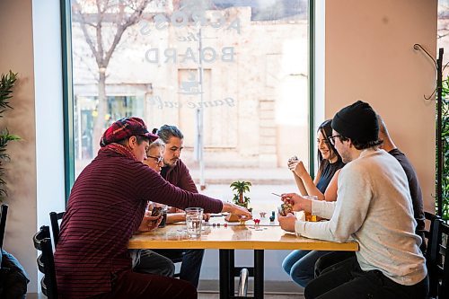 MIKAELA MACKENZIE / WINNIPEG FREE PRESS

Heidi Rowley (left), Barb Mulock, Serge Deroseirs, Chantelle Carpenter, Stephane Audette, and Paul Devigne play Camel Up, which is on the list of the best board games for Christmas, at Across the Board in Winnipeg on Tuesday, Dec. 3, 2019. For Olaf Pyttlik story.
Winnipeg Free Press 2019.