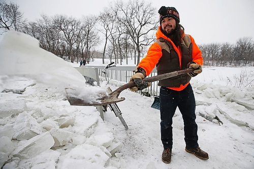JOHN WOODS / WINNIPEG FREE PRESS
Brad Hignell and another resident of Wolseley shovelled the snow and ice from Omands Creek after the city closed it to pedestrians in Winnipeg Sunday, December 15, 2019. 

Reporter: Solomon