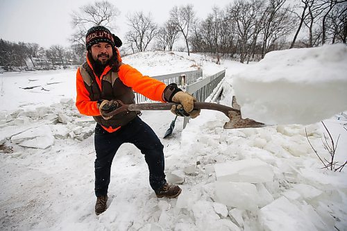 JOHN WOODS / WINNIPEG FREE PRESS
Brad Hignell and another resident of Wolseley shovelled the snow and ice from Omands Creek after the city closed it to pedestrians in Winnipeg Sunday, December 15, 2019. 

Reporter: Solomon