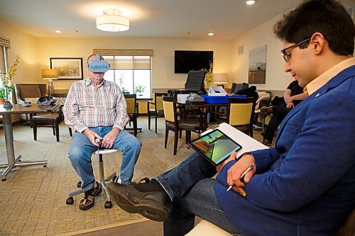 MIKE DEAL / WINNIPEG FREE PRESS
Ali Tavakoli takes notes while Wasyl Boyko, a resident at Brightwater Senior Living centre, takes part in the clinical trial study using a VR program called DoVille which was developed by Winnipeg technology studio, Project Whitecard.
191220 - Friday, December 20, 2019.