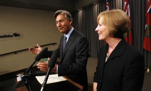 MIKE.DEAL@FREEPRESS.MB.CA 090827 Premier of Manitoba Gary Doer with his wife Ginny Devine at his side announces his retirement from politics at a press conference at the Manitoba Legislature. He did not announce the date he will be stepping down, though indicated that it would likely be at the beginning of October.  WINNIPEG FREE PRESS