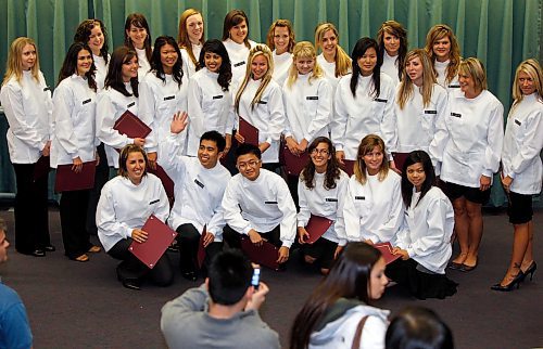 BORIS.MINKEVICH@FREEPRESS.MB.CA BORIS MINKEVICH / WINNIPEG FREE PRESS  090827 The University of Manitoba Faculty of Dentistry and School of Dental Hygiene White Coat ceremony at the Frederic Gaspard Hall of the Basic Medical Sciences Building. Group shot.  29 dentistry and 26 dental hygiene students this year.