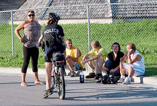 BORIS.MINKEVICH@FREEPRESS.MB.CA BORIS MINKEVICH / WINNIPEG FREE PRESS  090827 Bicycle police unit ride along. SOFT EDIT