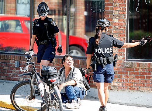 BORIS.MINKEVICH@FREEPRESS.MB.CA BORIS MINKEVICH / WINNIPEG FREE PRESS  090827 Bicycle police unit ride along. SOFT EDIT