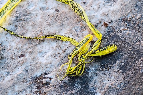 Mike Sudoma / Winnipeg Free Press
Police Tape lies on sidewalk on Sargent Avenue Friday afternoon
December 27, 2019