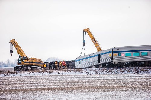 MIKAELA MACKENZIE / WINNIPEG FREE PRESS

Crews work on cleaning up a passenger train derailment near Katrime, Manitoba on Tuesday, Dec. 31, 2019. For Ben Waldman story.
Winnipeg Free Press 2019.