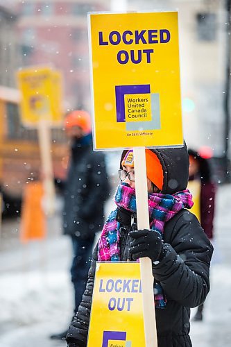 MIKAELA MACKENZIE / WINNIPEG FREE PRESS

Cherry Garcia holds a sign at a union rally of Tim Hortons employees outside of 1 Lombard Place in Winnipeg on Friday, Jan. 3, 2020. For Ben Waldman story.
Winnipeg Free Press 2019.