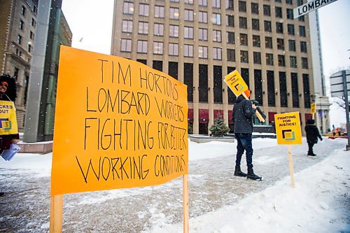 MIKAELA MACKENZIE / WINNIPEG FREE PRESS

A union rally of Tim Hortons employees takes place outside of 1 Lombard Place in Winnipeg on Friday, Jan. 3, 2020. For Ben Waldman story.
Winnipeg Free Press 2019.