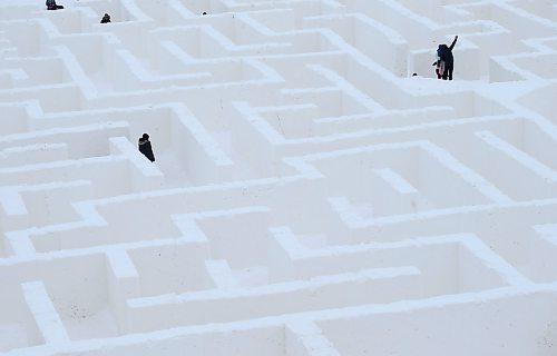 SHANNON VANRAES / WINNIPEG FREE PRESS
Visitors wind their way though a giant snow maze, stopping along the way to take selfies, on January 3, 2020. The maze is located near St. Adolphe and is considered the largest of its kind in the world.

