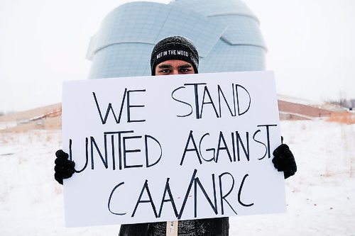 Daniel Crump / Winnipeg Free Press. Keerat Dhillon holds a sign during a demonstration against India's Citizenship Amendment Act and National Registration of Citizens laws. The rally which attracted several dozens of people was held outside the Canadian Museum For Human Rights Saturday afternoon. 4January 4, 2020.