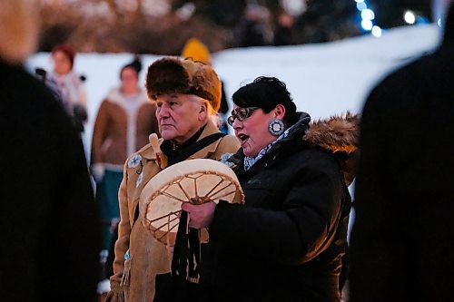 Daniel Crump / Winnipeg Free Press. Drummer Lisa Strong sings a song during a vigil for musician Kelly Fraser at the Odena Circle. January 4, 2020.