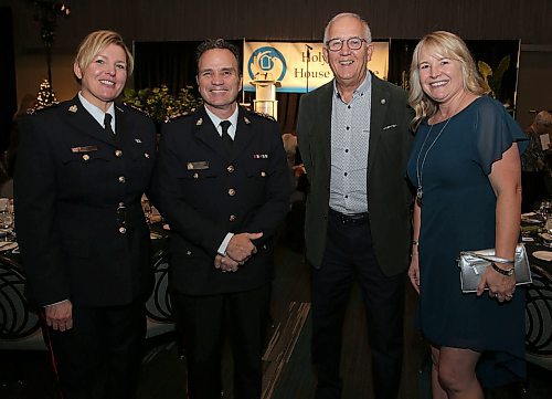 JASON HALSTEAD / WINNIPEG FREE PRESS

L-R: Winnipeg Police Service Superintendent Elizabeth Pilcher (the event's keynote speaker), WPS Chief Danny Smyth, Claude Michon and Michele Benoit at the annual House of Peace Welcome Home Dinner on Nov. 12, 2019 at the RBC Convention Centre Winnipeg. (See Social Page)