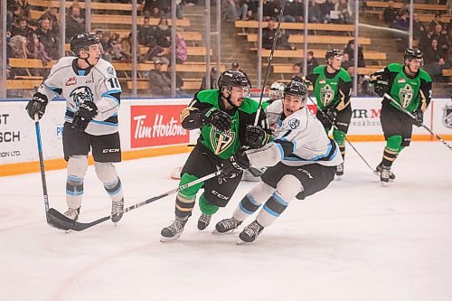 Mike Sudoma / Winnipeg Free Press
Winnipeg Ice Defence, Carson Lambos restricts Prince Albert Raiders Forward, Spencer Moe, as he chases the puck out of the Raiders end during first period of Sunday Nights game at Wayne Flemming Arena
January 5, 2020
