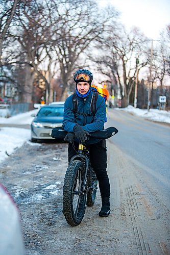 MIKAELA MACKENZIE / WINNIPEG FREE PRESS

Cyclist Nicholas Douville on Wolseley Avenue in Winnipeg on Tuesday, Jan. 7, 2020. For Maggie Macintosh story.
Winnipeg Free Press 2019.