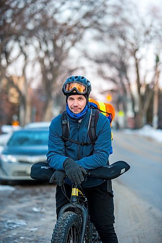 MIKAELA MACKENZIE / WINNIPEG FREE PRESS

Cyclist Nicholas Douville on Wolseley Avenue in Winnipeg on Tuesday, Jan. 7, 2020. For Maggie Macintosh story.
Winnipeg Free Press 2019.