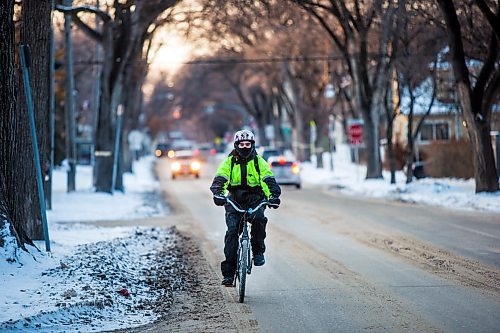 MIKAELA MACKENZIE / WINNIPEG FREE PRESS

Cyclist Santiago Lasko on Wolseley Avenue in Winnipeg on Tuesday, Jan. 7, 2020. For Maggie Macintosh story.
Winnipeg Free Press 2019.