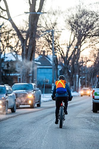 MIKAELA MACKENZIE / WINNIPEG FREE PRESS

Cyclist Nicholas Douville on Wolseley Avenue in Winnipeg on Tuesday, Jan. 7, 2020. For Maggie Macintosh story.
Winnipeg Free Press 2019.