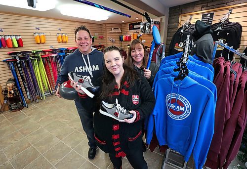 RUTH BONNEVILLE  /  WINNIPEG FREE PRESS 


LOCAL  Biz  - Asham Curling Supplies

Asham Curling Supplies, McPhillips St. Founder, Arnold Asham.  (Arnold is out of the country on business at time of photo shoot)

Photo of Arnold Asham's children in the store.
Names: Nathan Asham, Amanda Asham (grey hoodie) and Kate Asham (black & red hoodie).  

Photos for a two-page Sunday Special, touching on the 40th anniversary of Asham Curling Supplies, one of a handful of dedicated curling stores in the country, maybe the world! 

Arnold Asham started the biz by making sliders for curlers' shoes in the basement of his home; demand was such that he opened a retail location in 1980 and has been a trend-setter in the sport ever since, coming out with new designs for shoes, brooms, etc. 

Reporter: David Sanderson


 Jan 3rd,  2020