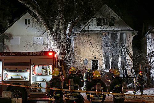 SHANNON VANRAES / WINNIPEG FREE PRESS
Members of the Winnipeg Fire Paramedic Service work to extinguish hotspots after a fire gutted a house at 346 Maryland St. on January 9, 2020.