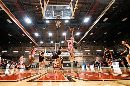 Mike Sudoma / Winnipeg Free Press
University of Winnipeg Wesmen Guard, Lena Wenke goes in for a layup during Friday evenings game against the Macewan University Griffins.
January 10, 2020