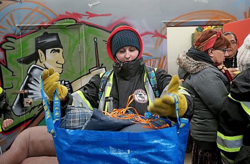 SHANNON VANRAES / WINNIPEG FREE PRESS
Rachel Clark loads a large tote bag with supplies, like sleeping bags and mittens, before heading into bone chilling temperatures with the West Broadway Bear Clan Patrol on January 10, 2020.