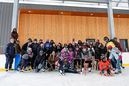 Daniel Crump / Winnipeg Free Press. New comers, as well as members of IRCOM and the True North Youth Foundation pose for a group photo after a skating event at Camp Manitou. January 11, 2020.