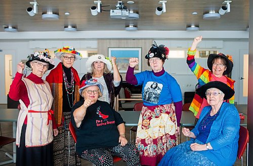 MIKAELA MACKENZIE / WINNIPEG FREE PRESS

The Raging Grannies Adina Lyon (standing left-right), Christa Froese, Shirley Miles, Lois Masur, Debby Lake, Leube Franko (seated left-right), and Helen Smiley pose for a group portrait before a meeting at the Old Grace Housing Co-op in Winnipeg on Monday, Jan. 13, 2020. For Brenda Suderman story.
Winnipeg Free Press 2019.