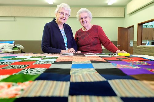 RUTH BONNEVILLE  /  WINNIPEG FREE PRESS 

FAITH - MCC quilting Circle at Springstein Mennonite Church, 

Photos of Women from Springstein Mennonite Church making quilts for Mennonite Central Committee in advance of their 100th year celebration and drive to make and collect 6,500 blankets in one day which takes place on Saturday, January 18th. 
Photo of  two of the 3 women who started the quilting circle over 40 years ago, Trudy Rempel (91yrs old, blue jacket) and Hilda Wiebe (in her 80's), working together on pinning the backing onto quilt Wednesday.  

Reporter: Brenda Suderman,

Jan 15th,  2020