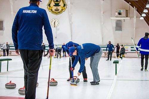 MIKAELA MACKENZIE / WINNIPEG FREE PRESS

Virginia curling team members Travis Hamilton (left), Sam Sparks, and Austin Shawinsky play in the MB Open at Fort Rouge Curling Club in Winnipeg on Friday, Jan. 17, 2020. For Taylor Allen story.
Winnipeg Free Press 2019.