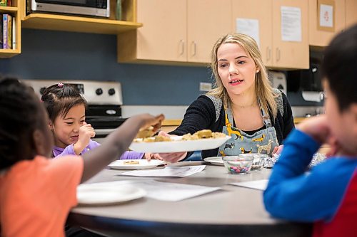 MIKAELA MACKENZIE / WINNIPEG FREE PRESS

Stephanie Fehr makes cookies with kindergarten students Shan Shan Yiyang (left), Leilah Nyagudi, and Ryan Chi at Linden Meadows School as part of a cooking and reading program in Winnipeg on Friday, Jan. 17, 2020. For Danielle Da Silva story.
Winnipeg Free Press 2019.