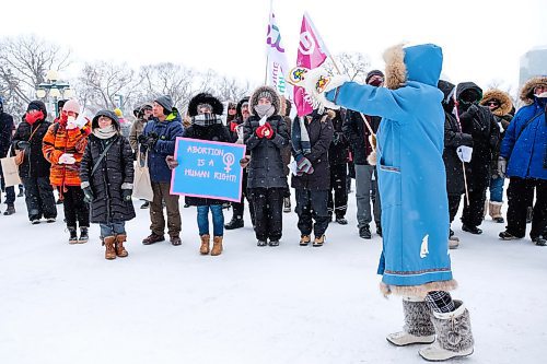 Daniel Crump / Winnipeg Free Press. Karen Kowalchuk (front) and others take part in the 2020 Womens March at the Manitoba Legislature Saturday morning. January 18, 2020.