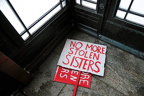 Daniel Crump / Winnipeg Free Press. Signs from the Winnipeg Womens March lay on the floor just inside the doors of the Manitoba Legislature after the march Saturday Morning. January 18, 2020.