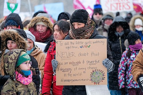 Daniel Crump / Winnipeg Free Press. People hold signs and march during the 2020 Womens March at the Manitoba Legislature. This years march is focused on the right to decide on one's own body. January 18, 2020.