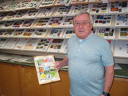 Canstar Community News Jan. 15, 2020 - T & T Seeds manager Kevin Twomey holds this year's company seed catalogue that it in its 75th year of publication. (ANDREA GEARY/CANSTAR COMMUNITY NEWS)
