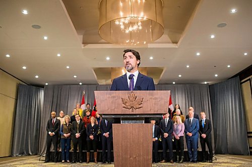 MIKAELA MACKENZIE / WINNIPEG FREE PRESS

Prime Minister Justin Trudeau speaks to the media with cabinet ministers behind him during the cabinet retreat at the Fairmont Hotel in Winnipeg on Tuesday, Jan. 21, 2020. For Dan Left/Larry Kusch story.
Winnipeg Free Press 2019.