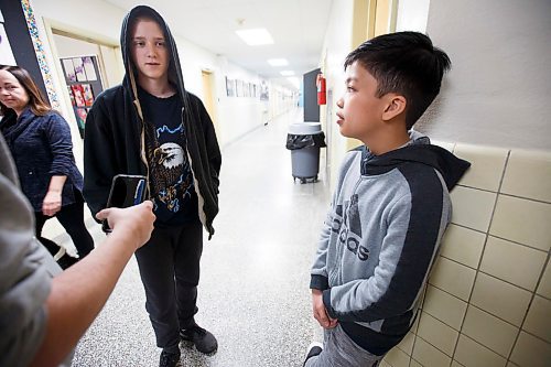 MIKE DEAL / WINNIPEG FREE PRESS
Tryouts for a new sports team that represents the future of athletics in Manitoba: the eSports team at Archwood School.
(from left) Derek Robillard and Yzaiah Cantos are interviewed in the hallway during tryouts.
200110 - Friday, January 10, 2020.