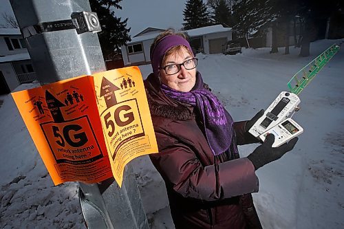 JOHN WOODS / WINNIPEG FREE PRESS
Margaret Friesen, a retired federal biologist, holds radiation meters beside information bulletin about the health dangers related to 5G cell technology on the lamppost in her Winnipeg neighbourhood Wednesday, January 22, 2020. Friesen is the local lead on an international movement opposed the deployment of 5G telecommunications networks because of the uncertainty regarding heath concerns. 5G networks will necessitate the erection of 10s of thousands of small antennae and satellites. Friesen and others believe regulations should require buried fibre optic cables rather than wireless towers.

Reporter: Cash