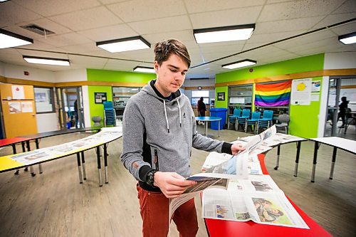 MIKAELA MACKENZIE / WINNIPEG FREE PRESS

Grade 11 student Bartek Dwornik reads the Winnipeg Free Press, which is laid out in the common area every morning, at the Maples Met in Winnipeg on Friday, Jan. 24, 2020. For Melissa Martin story.
Winnipeg Free Press 2019.